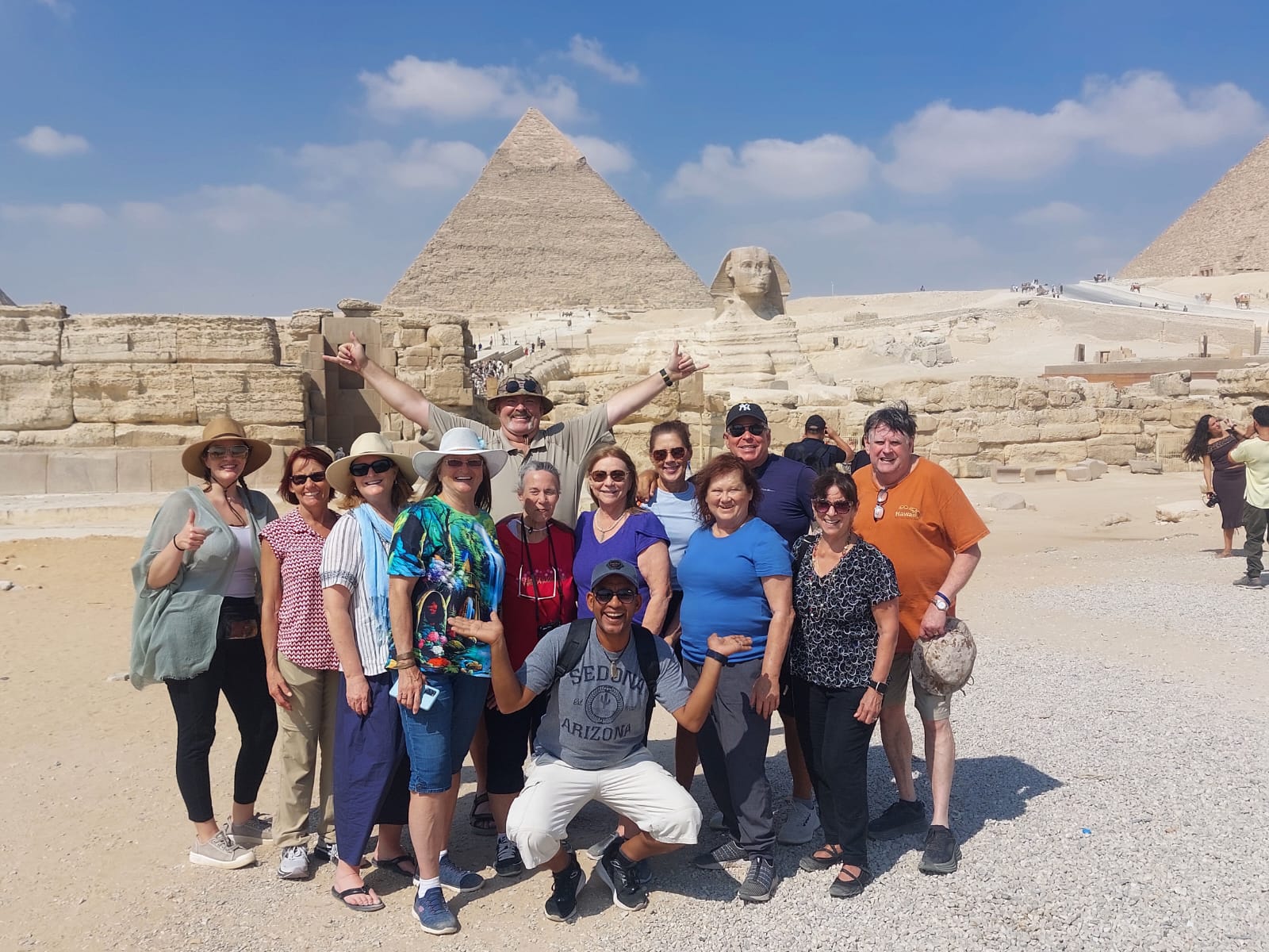 Small group in front of the Pyramids and Sphinx at Giza