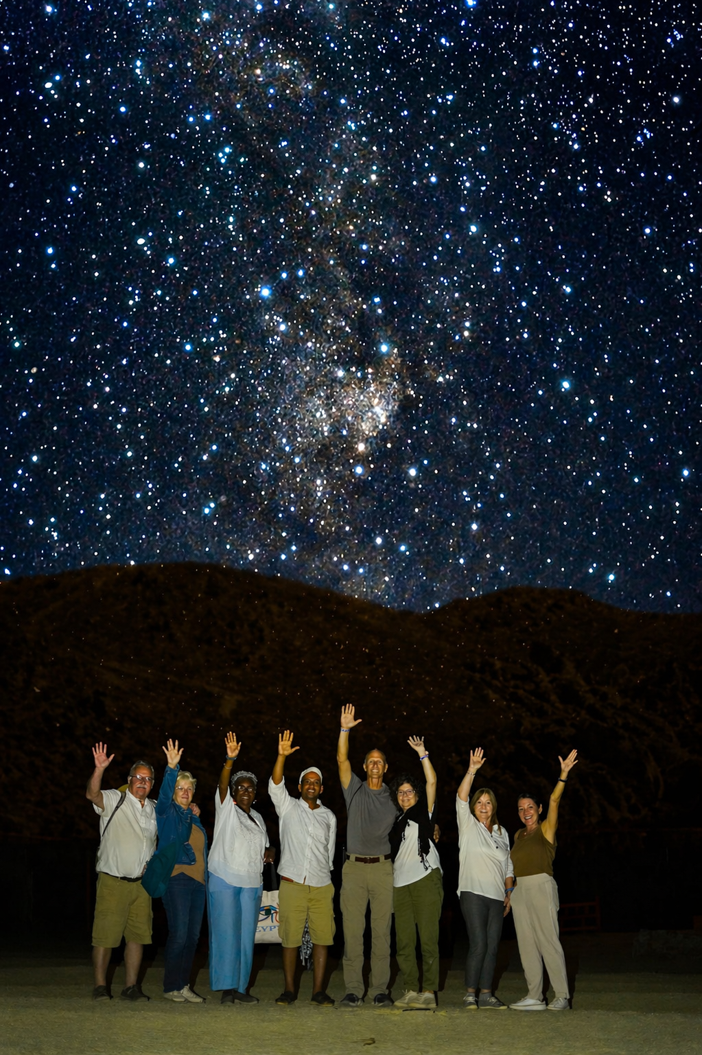 Egypt Adventures group stargazing under the night sky